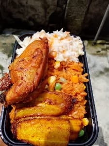 Jollof Rice + chicken + plantain and salad