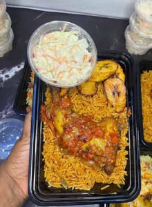Jollof rice, plantain, chicken and coleslaw