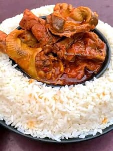 A plate of rice with ofeakwu