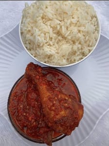white rice and stew with chicken