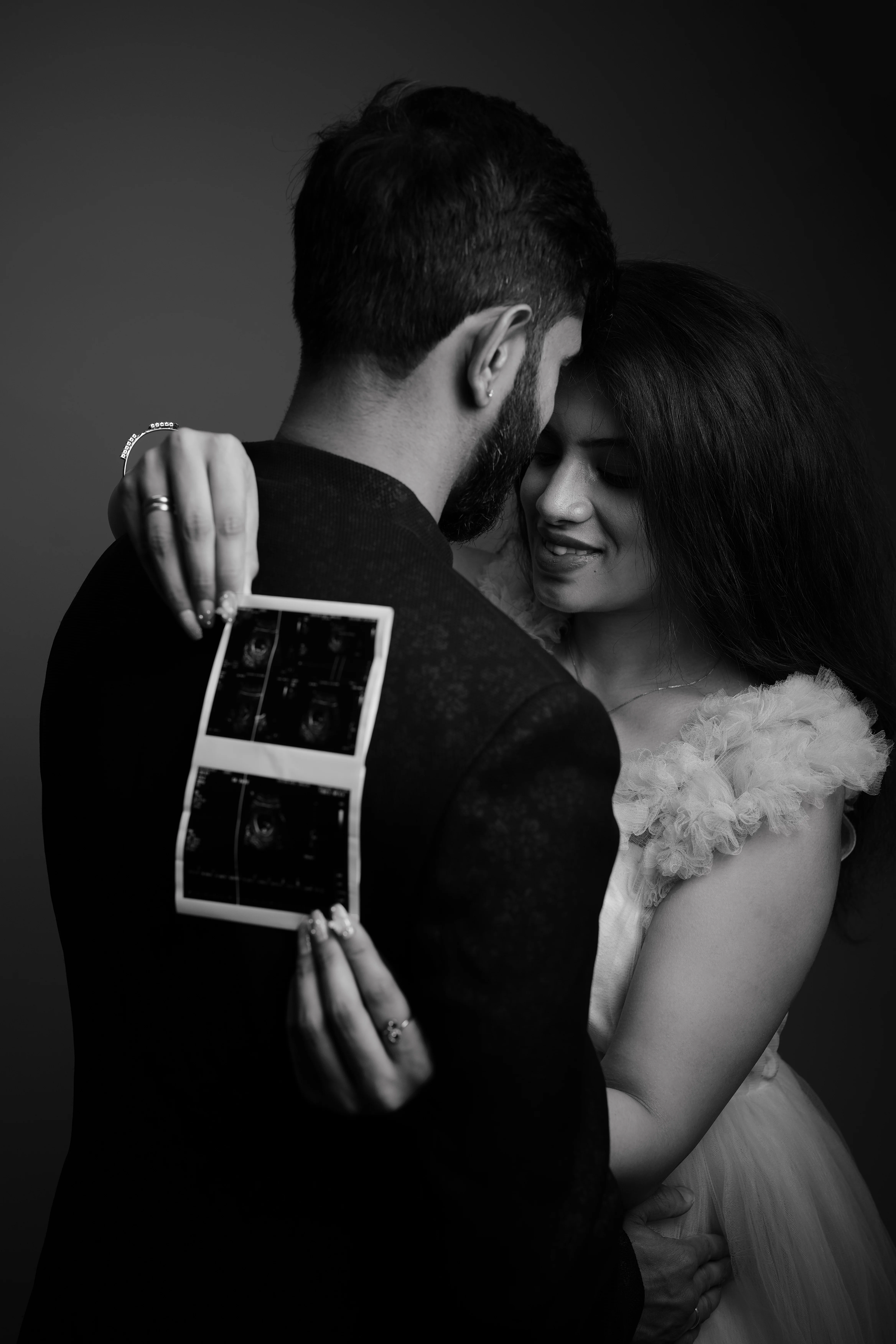 Maternity photoshoot session at RP Studios Bangalore with seated editorial styling