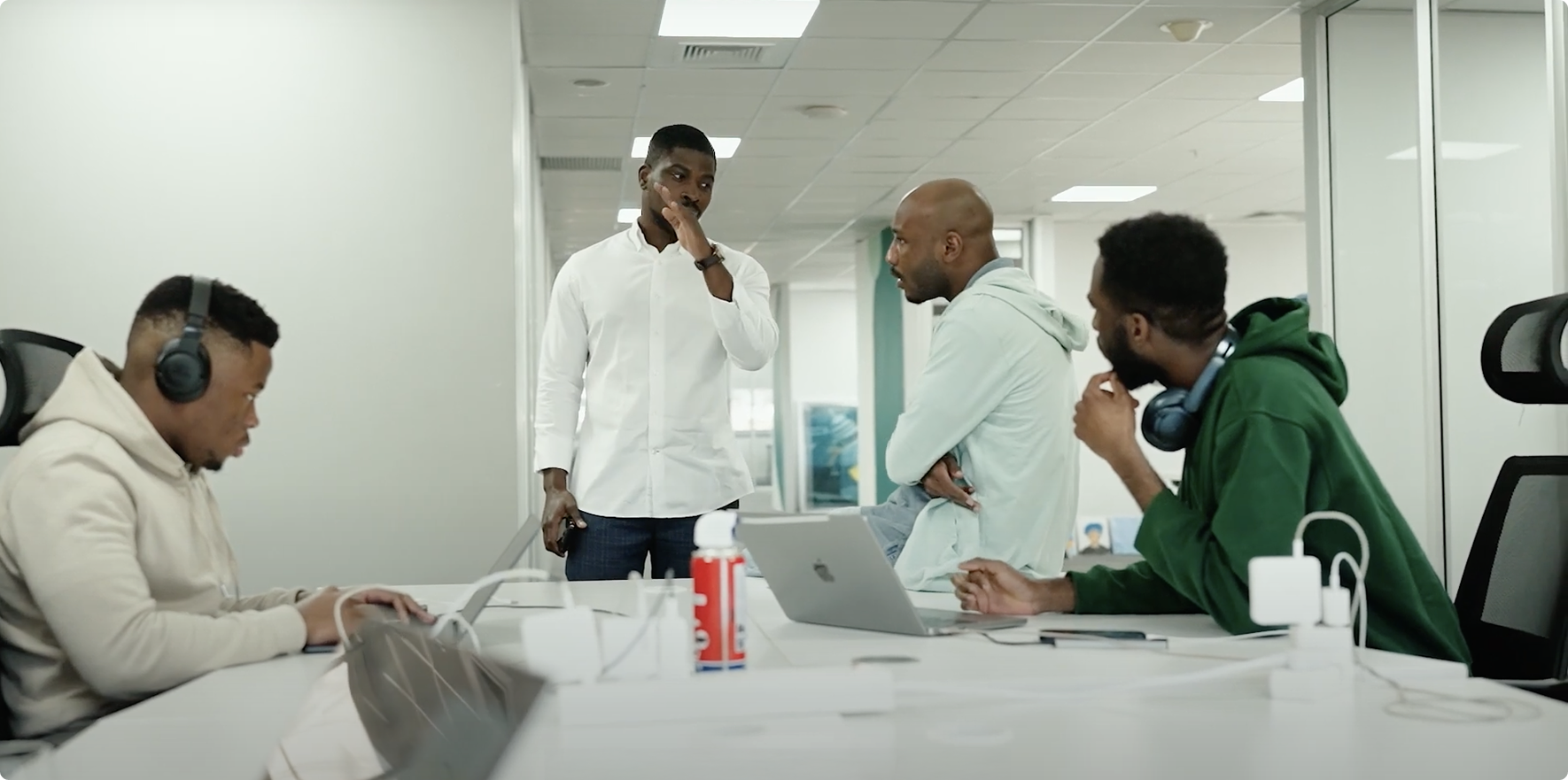 Modern office environment with team members collaborating