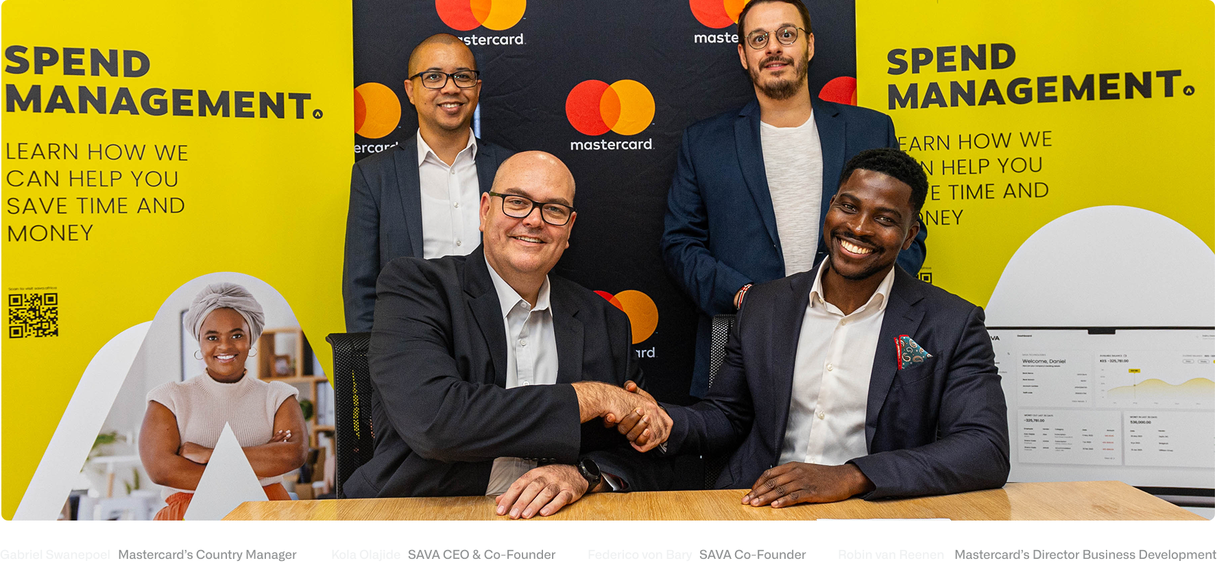 Team meeting with three professionals in an office setting