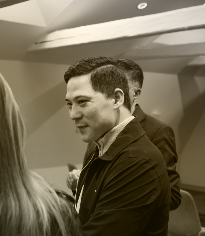 Group of executives networking in person