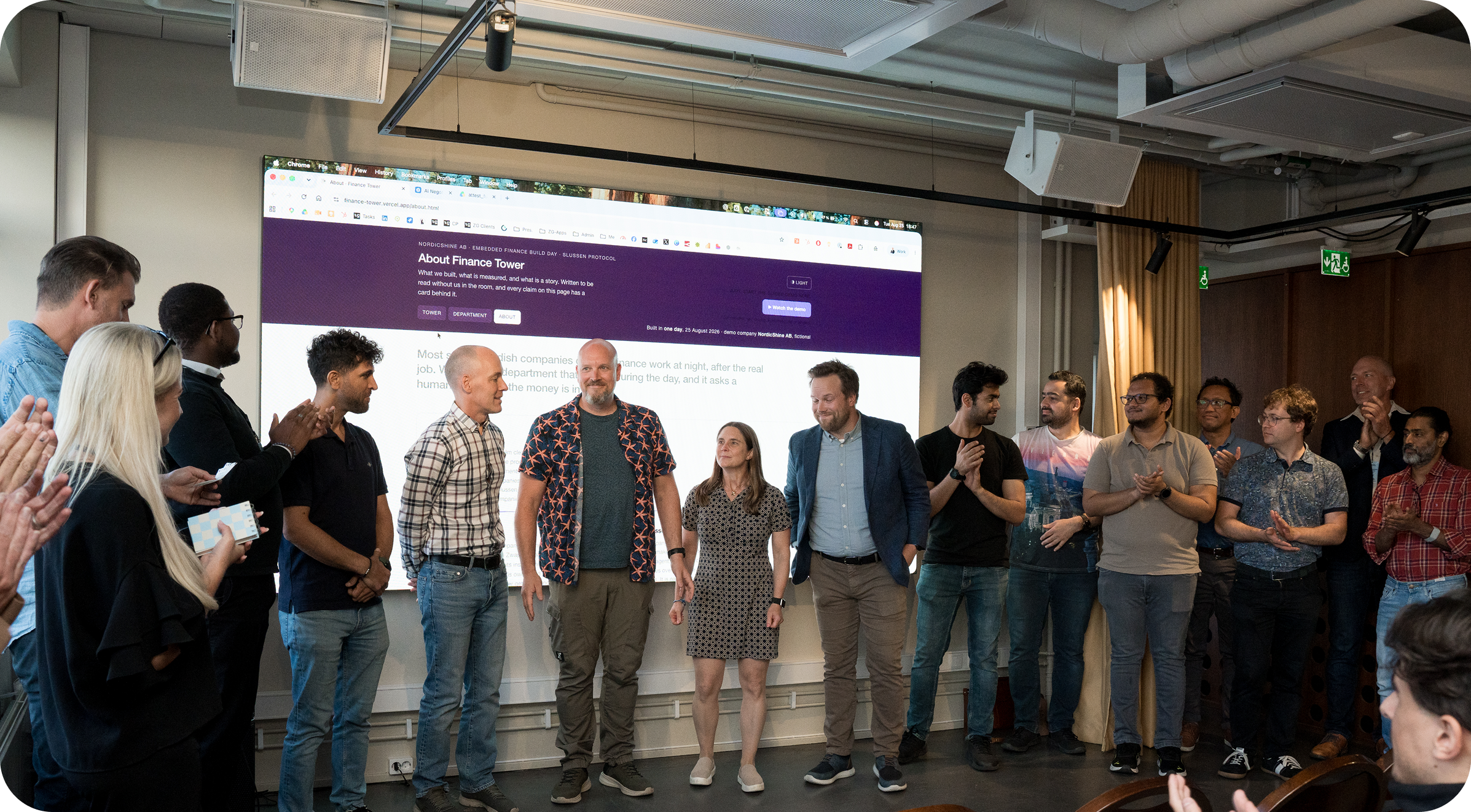 Teams presenting to a room at a Stockholm fintech event hosted by Alexandra Studio