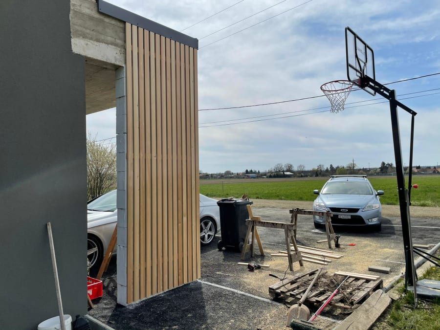 Garage facade in Wildhaus with timber slats, Wildhaus (SG), CH