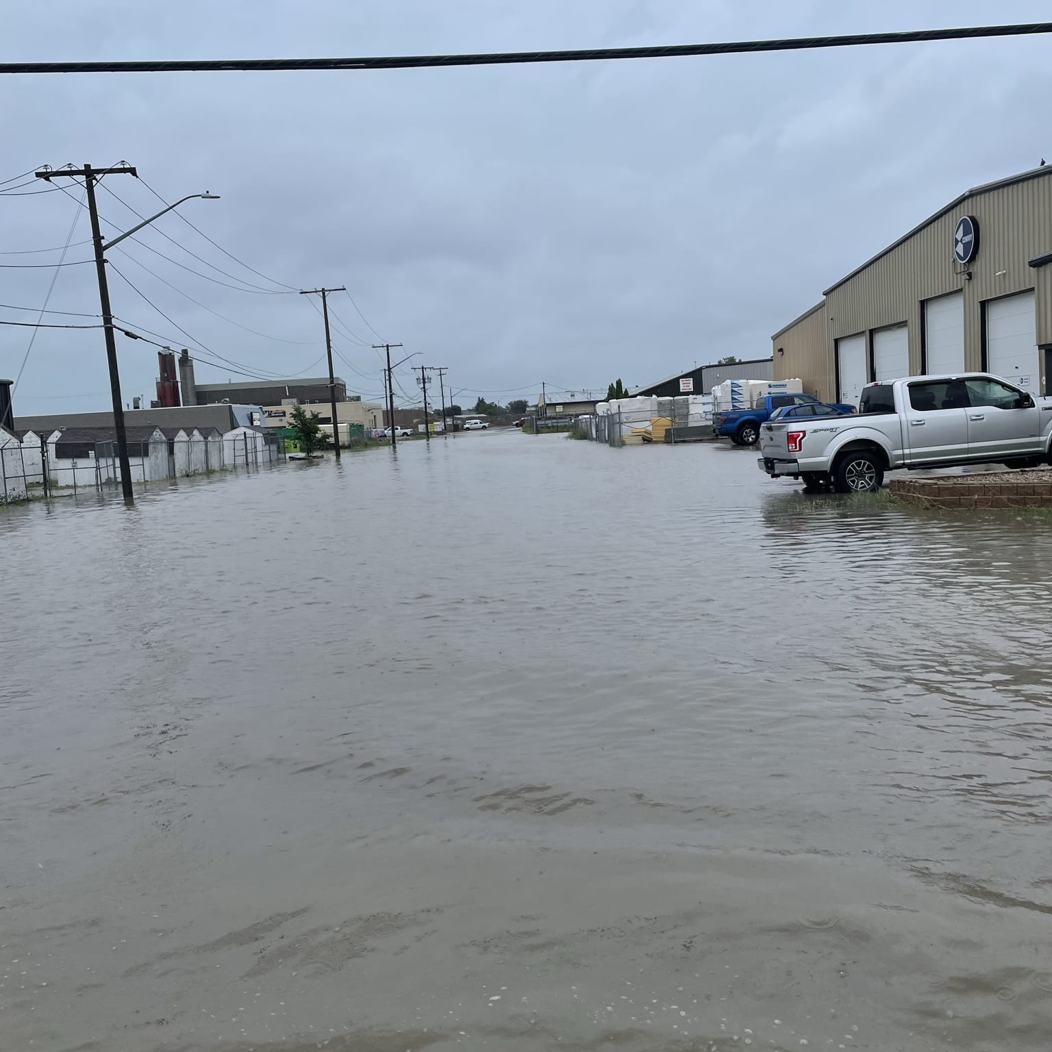 flooded streets in Regina after heavy rainfall. Call Canada Wide Restoration Flood Restoration Services