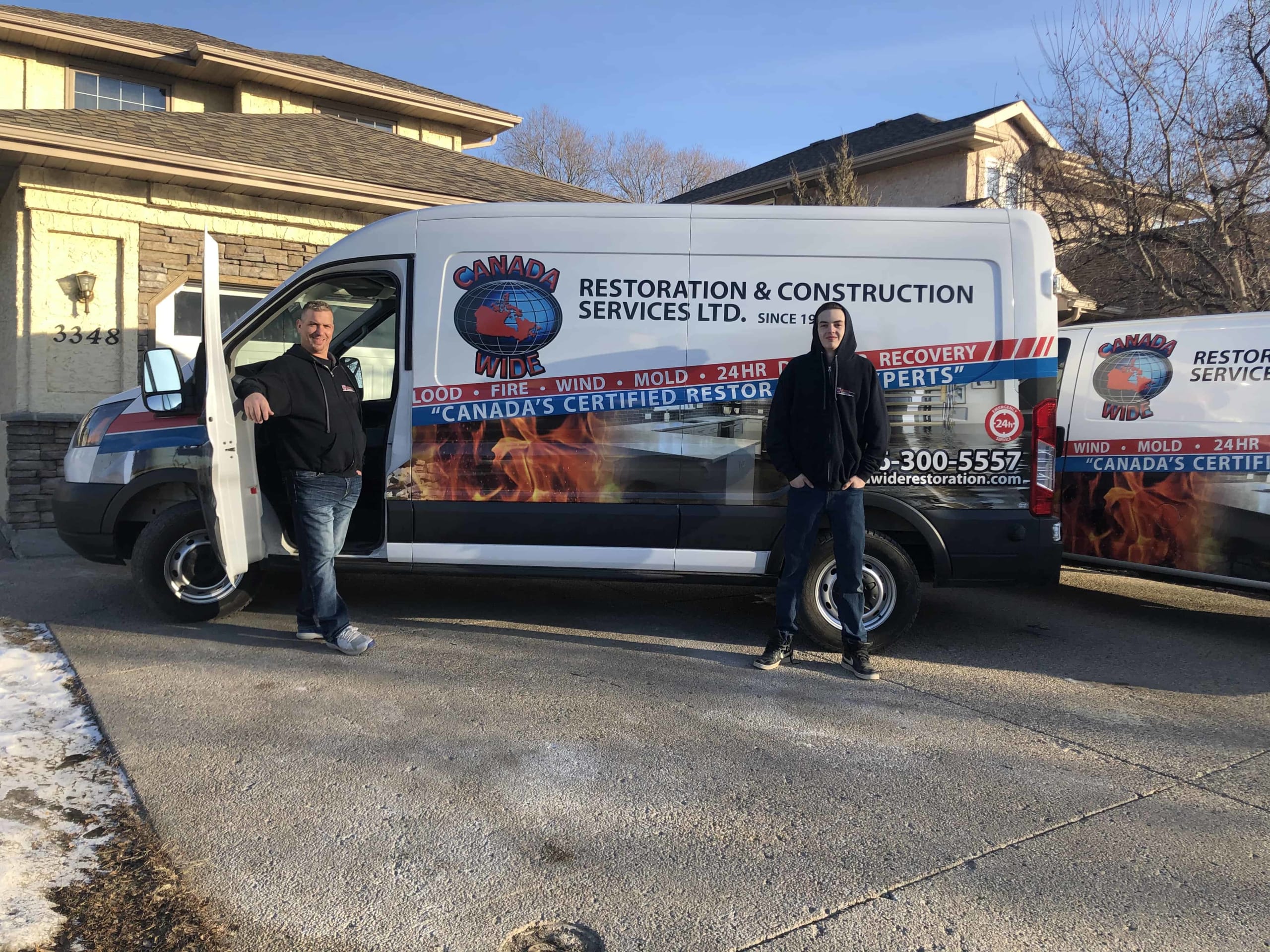 Canada Wide Restoration Truck and Employees read for the job