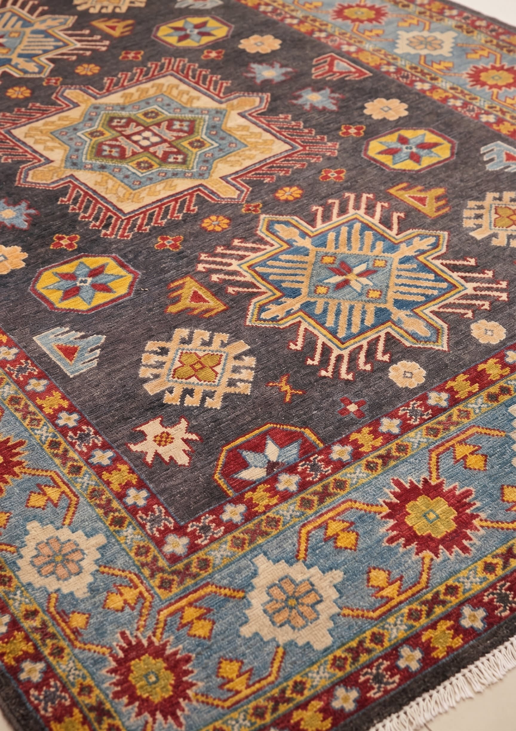 Kazak Medallion Charcoal, Caucasian-style, Afghan-Kazak (likely Kabul or Ghazni province, Afghanistan) tribal rug, in charcoal grey, Wool, 171x244 cm, Nasim Carpets Malaysia — view 3