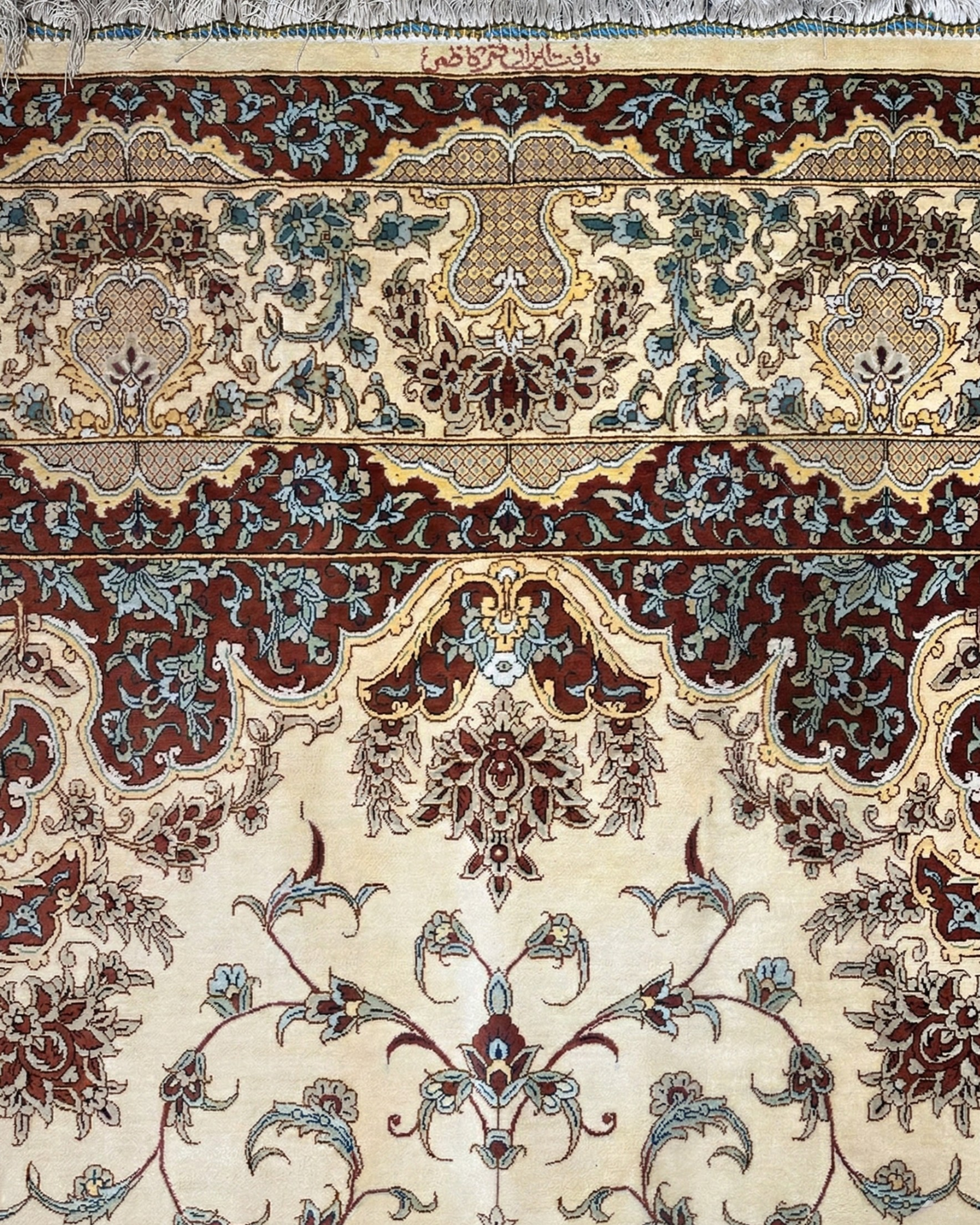 Persian ivory medallion rug — the kind of heirloom that defines a room for generations