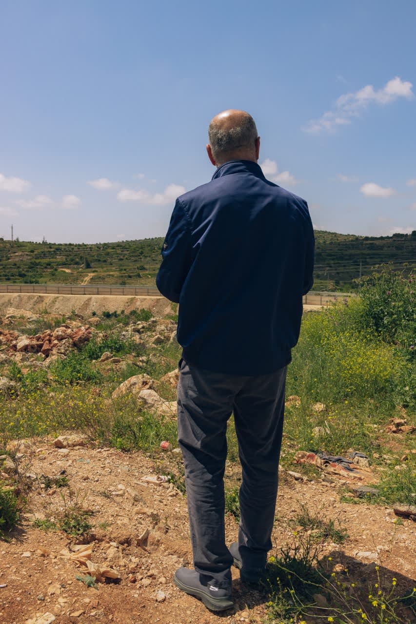 Mohammad Al-Sbeih, Palestinian landowner, in Al-Khader looking over the illegal settlement of Neve Daniel.