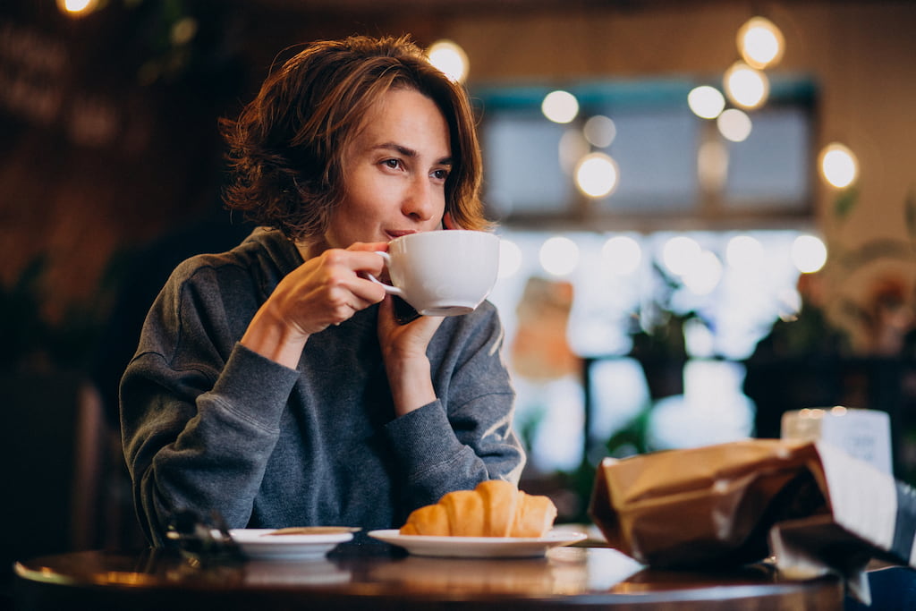 woman drinking coffee