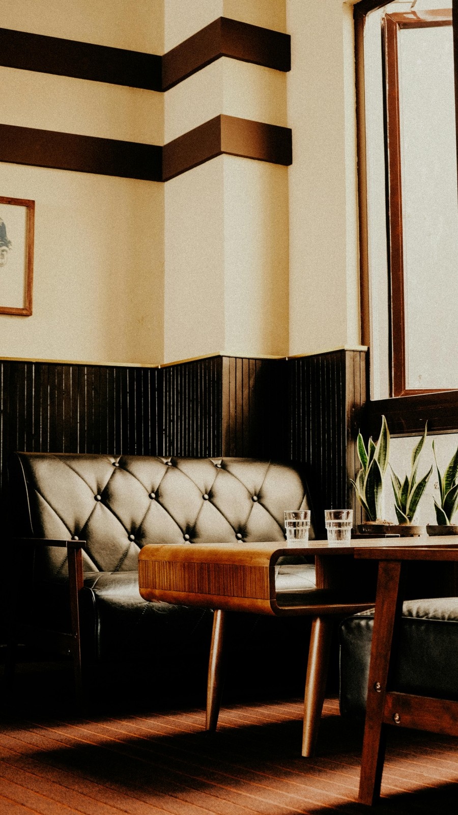 Luxury interior design - elegant corner with minimalist shelving, bonsai plant, and modern lighting