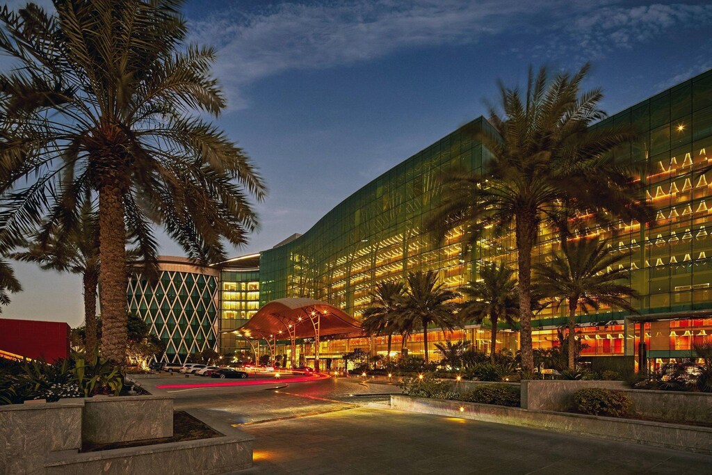 Meydan Grandstand office complex in Dubai at dusk
