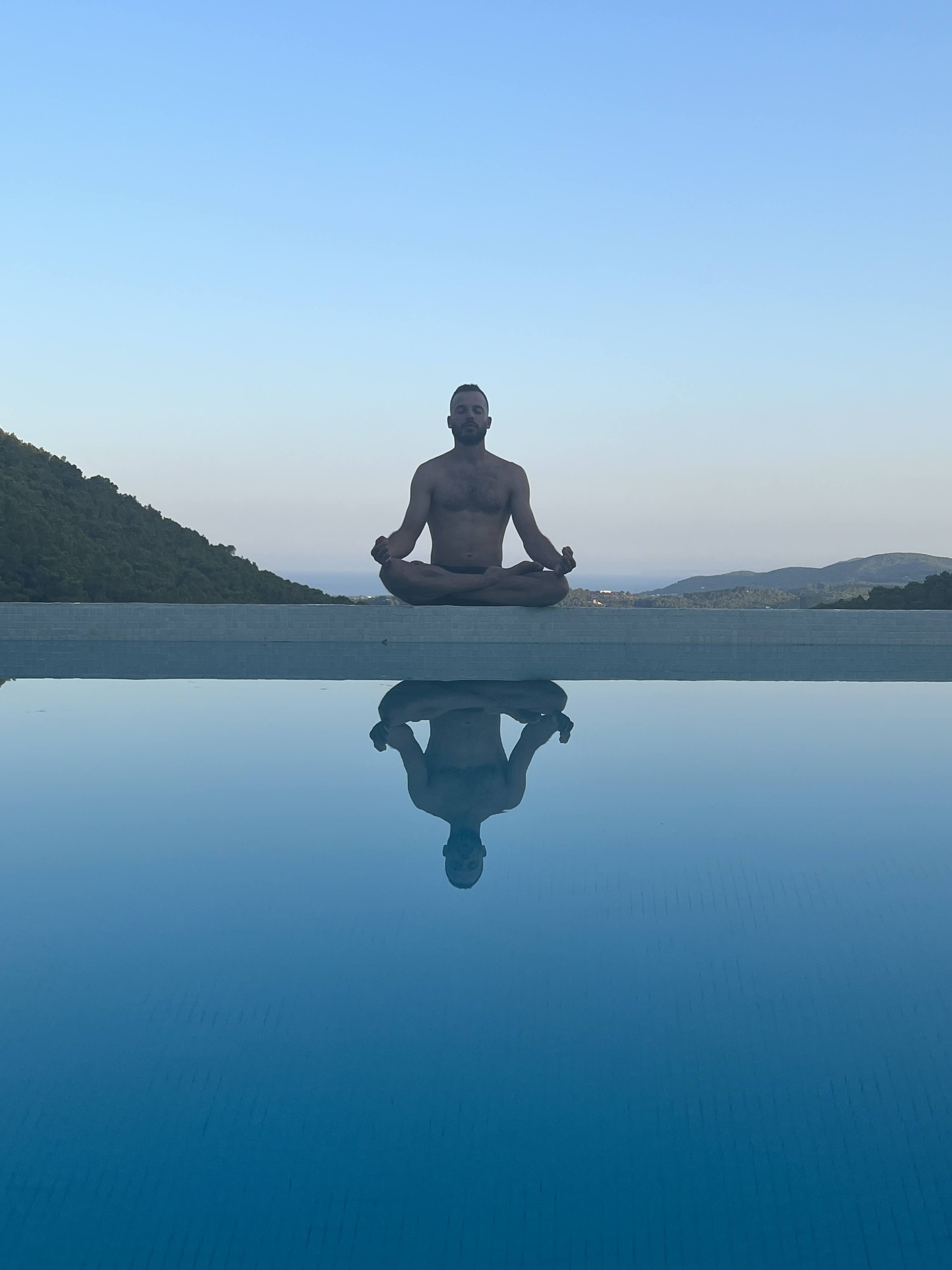 Xavier meditating at sunrise
