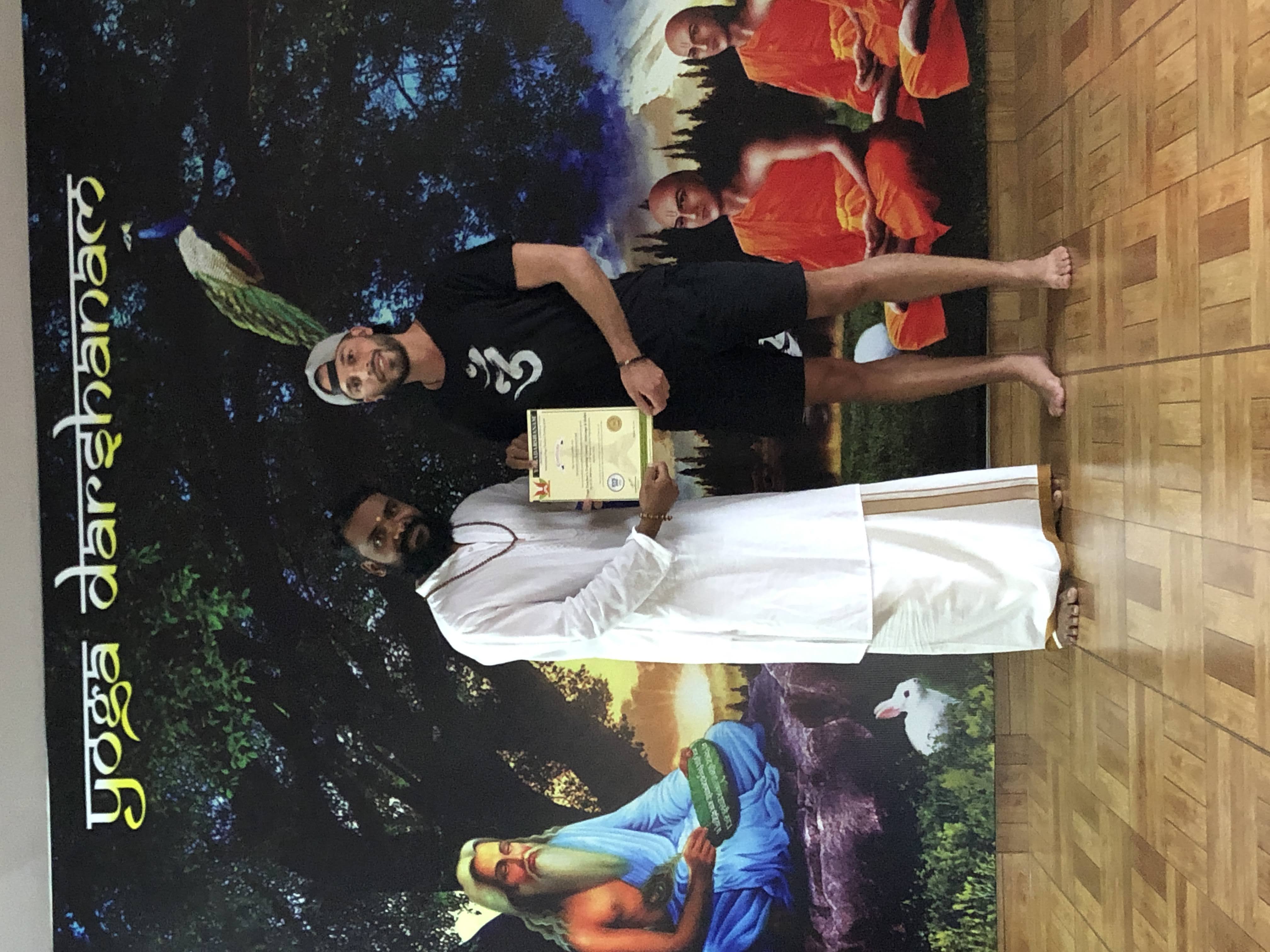 Xavier receiving certification at Yoga Darshanam
