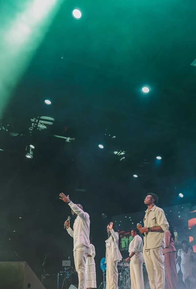 AYAC USA worship team in white on stage