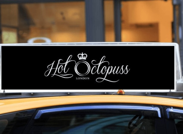 hot octopuss logo above a car