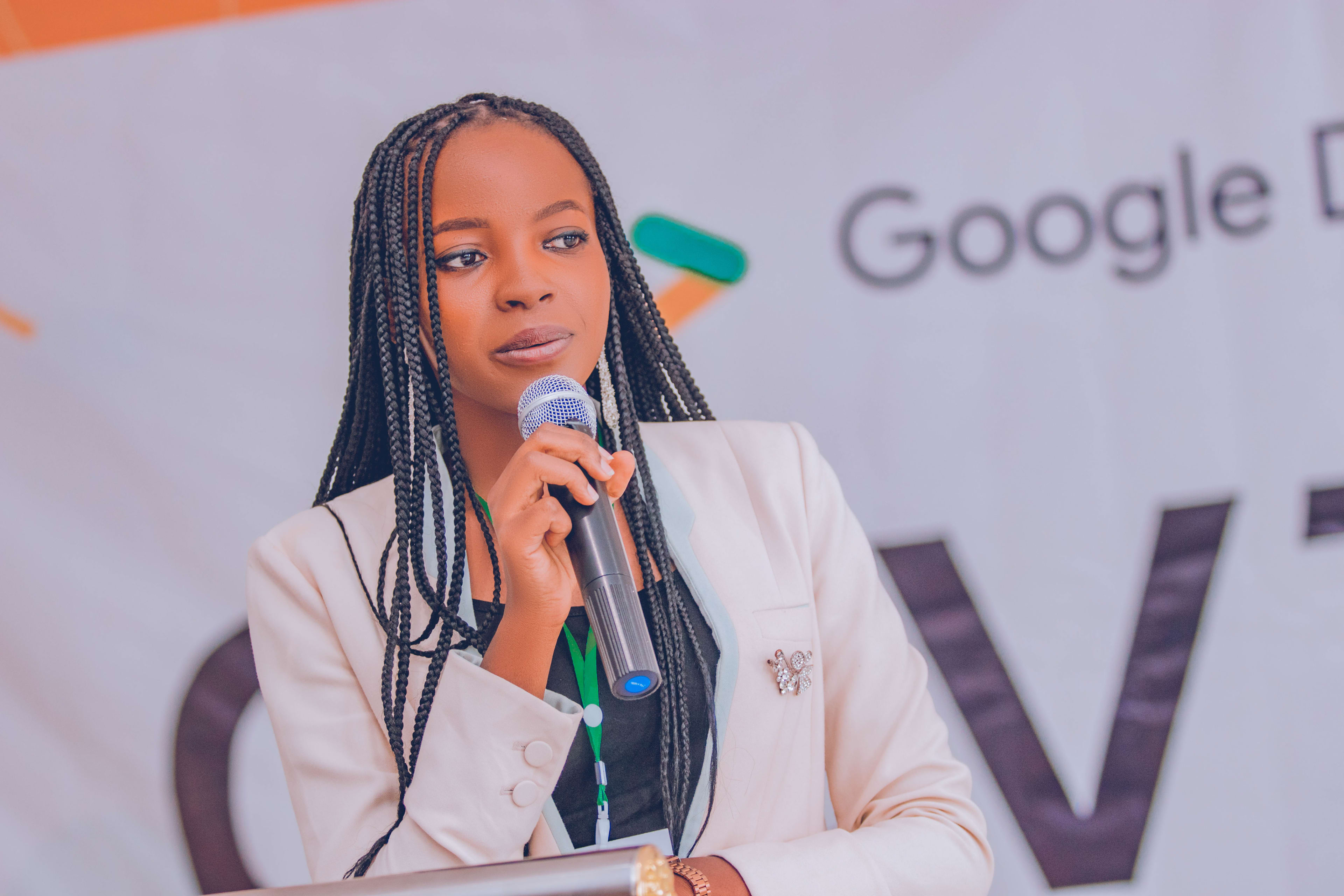 A speaker addressing the DevFest Jos audience