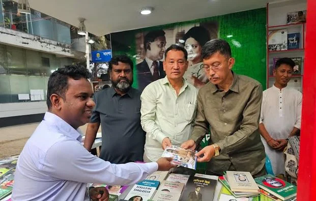 অমর একুশে বইমেলায় স্টল পরিদর্শন করলেন মন্ত্রী দীপেন দেওয়ান