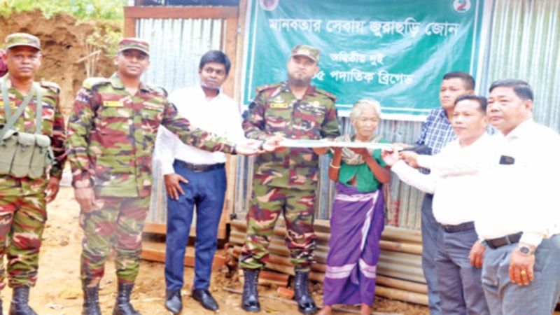 নতুন ঘর পেয়ে কেঁদে ফেললেন বিধবা লুংঘাছড়ি চাকমা