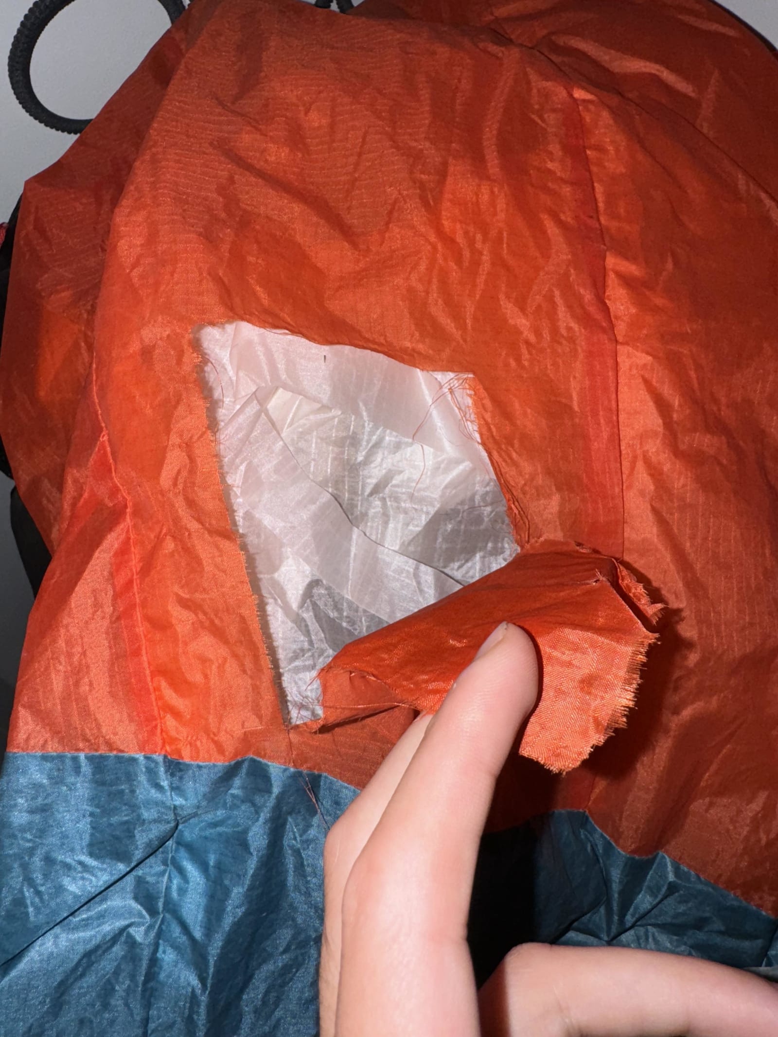 Small rip can be repaired with rip-stop adhesive tape