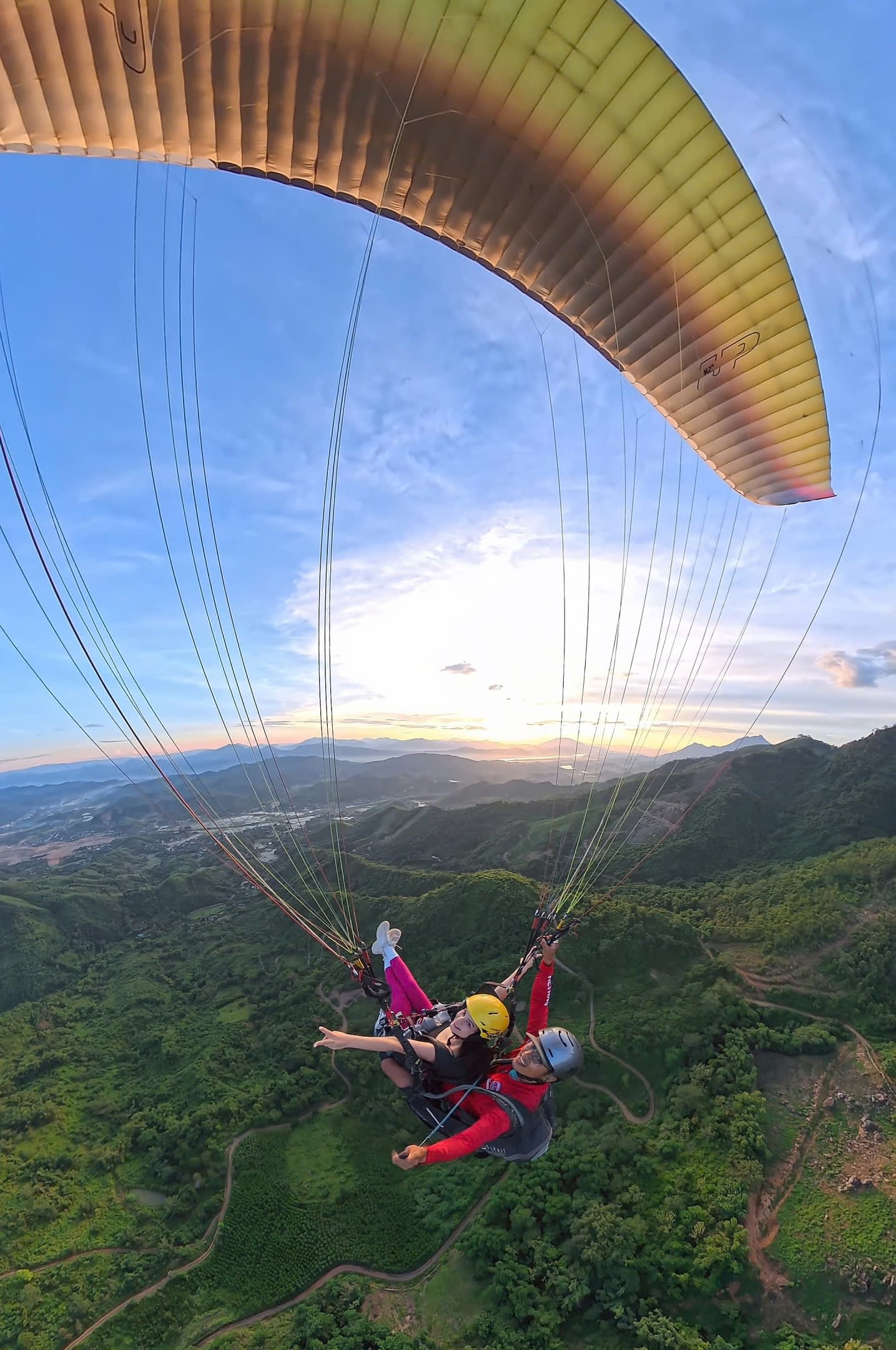 Paragliding off Vien Nam Peak with Da River ahead