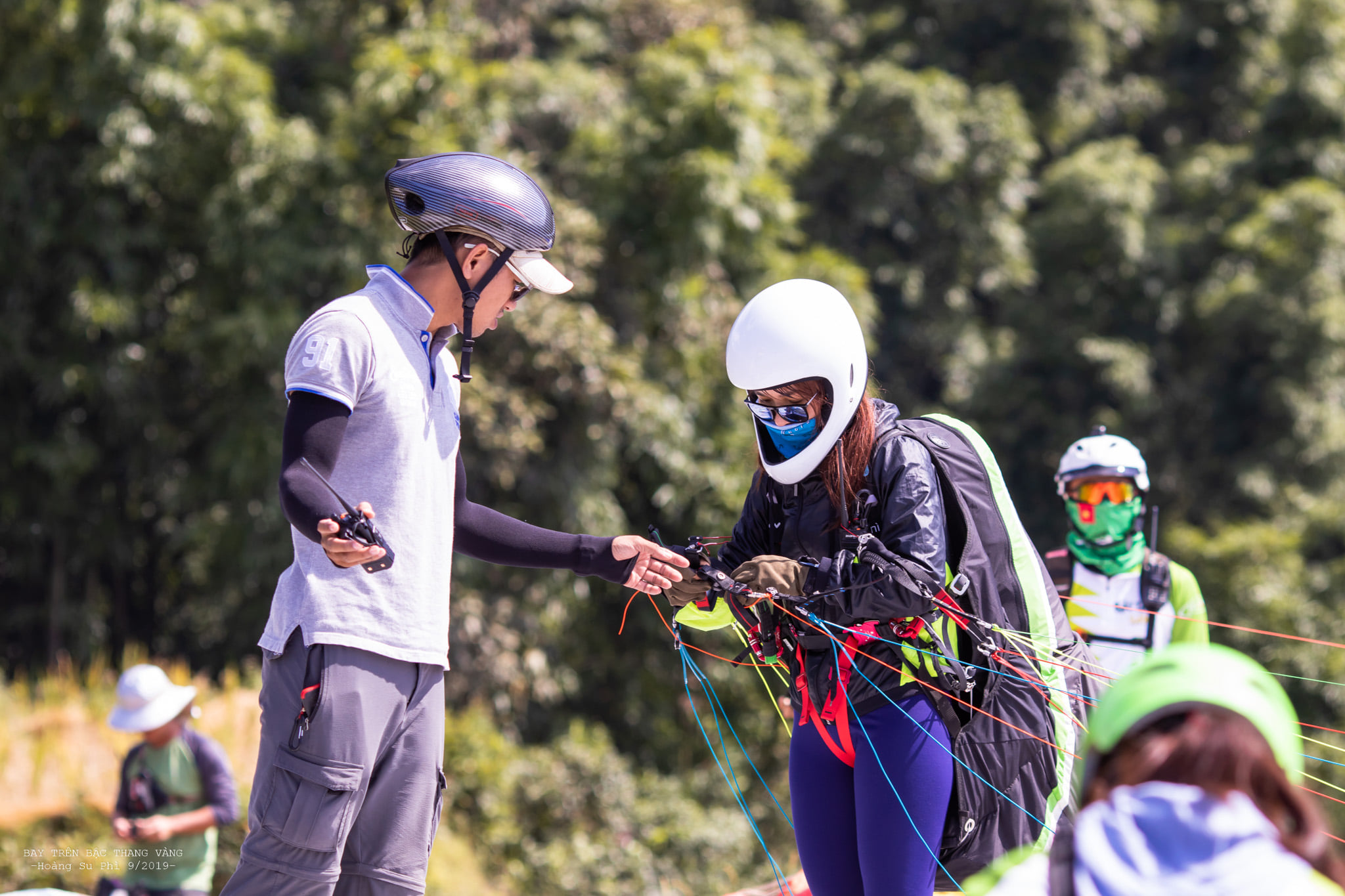 A student pilot being guided through take-off by an instructor