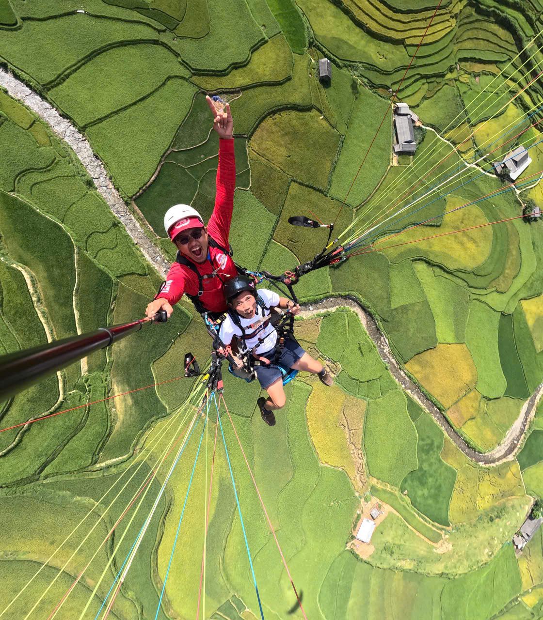 A busy day in the life of a Vietnamese paraglider pilot
