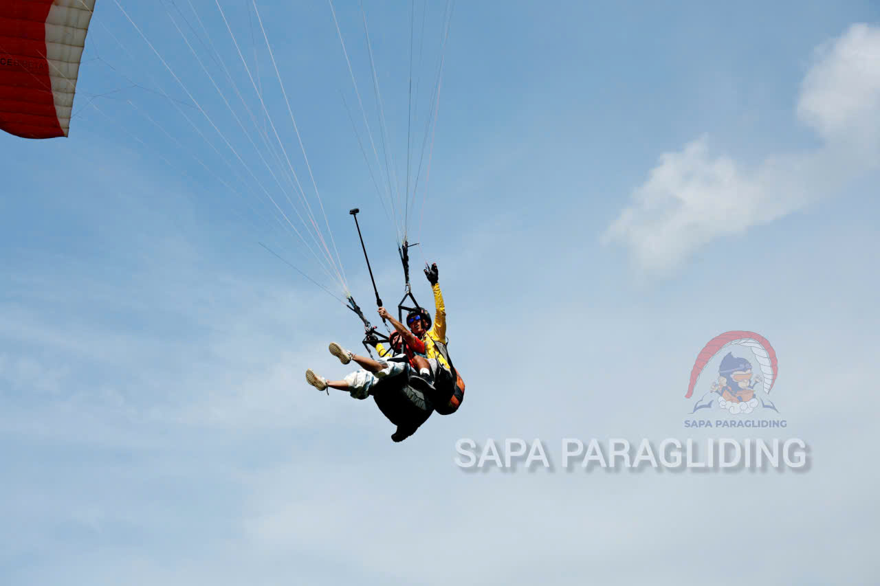 A busy day in the life of a Vietnamese paraglider pilot