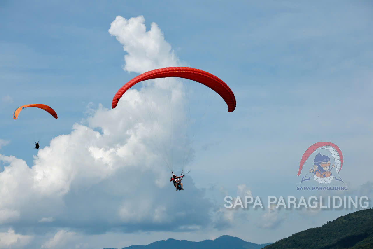 A busy day in the life of a Vietnamese paraglider pilot