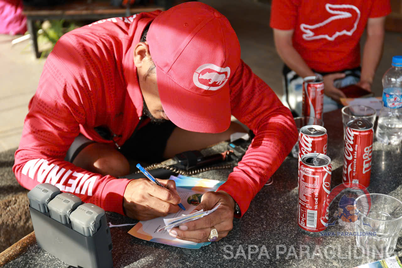 A busy day in the life of a Vietnamese paraglider pilot