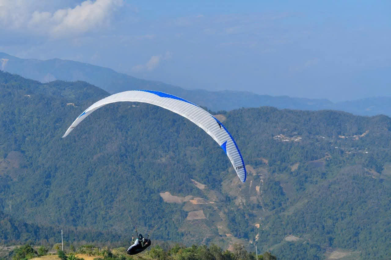 An advanced pilot flying a high-performance wing
