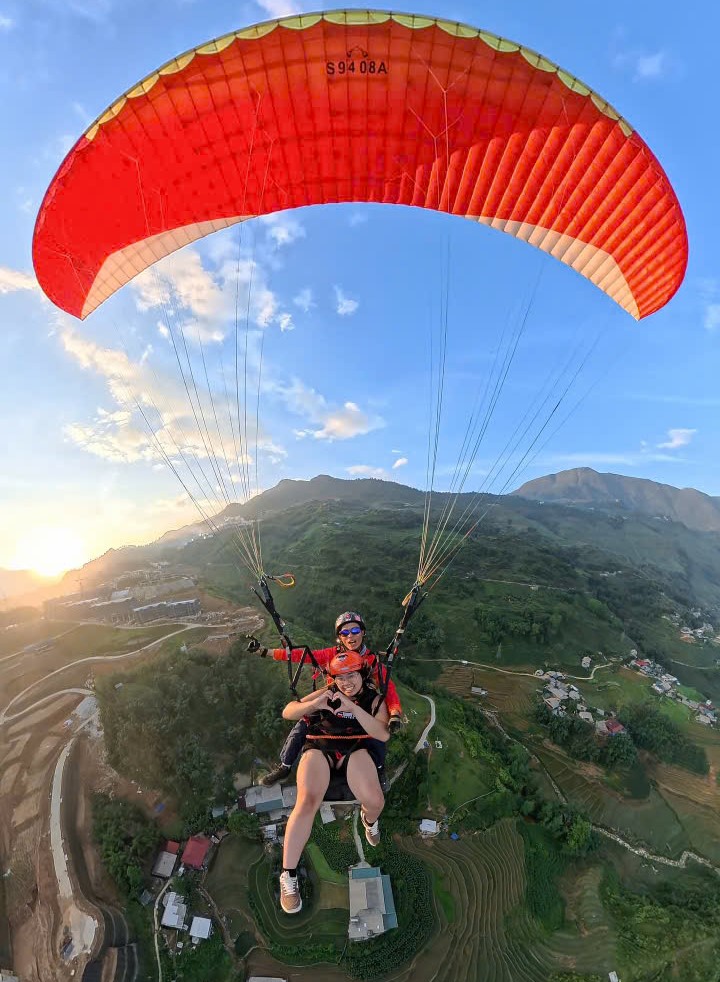 Sunset paragliding – when you truly touch the sky