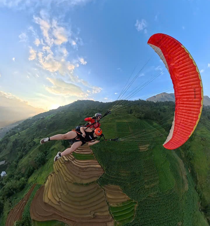 Sunset paragliding – when you truly touch the sky