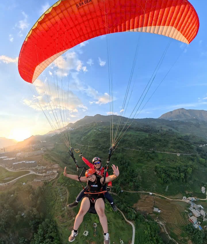 Sunset paragliding – when you truly touch the sky