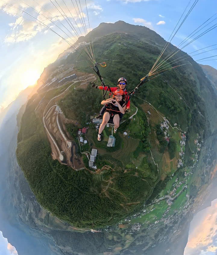 Sunset paragliding – when you truly touch the sky