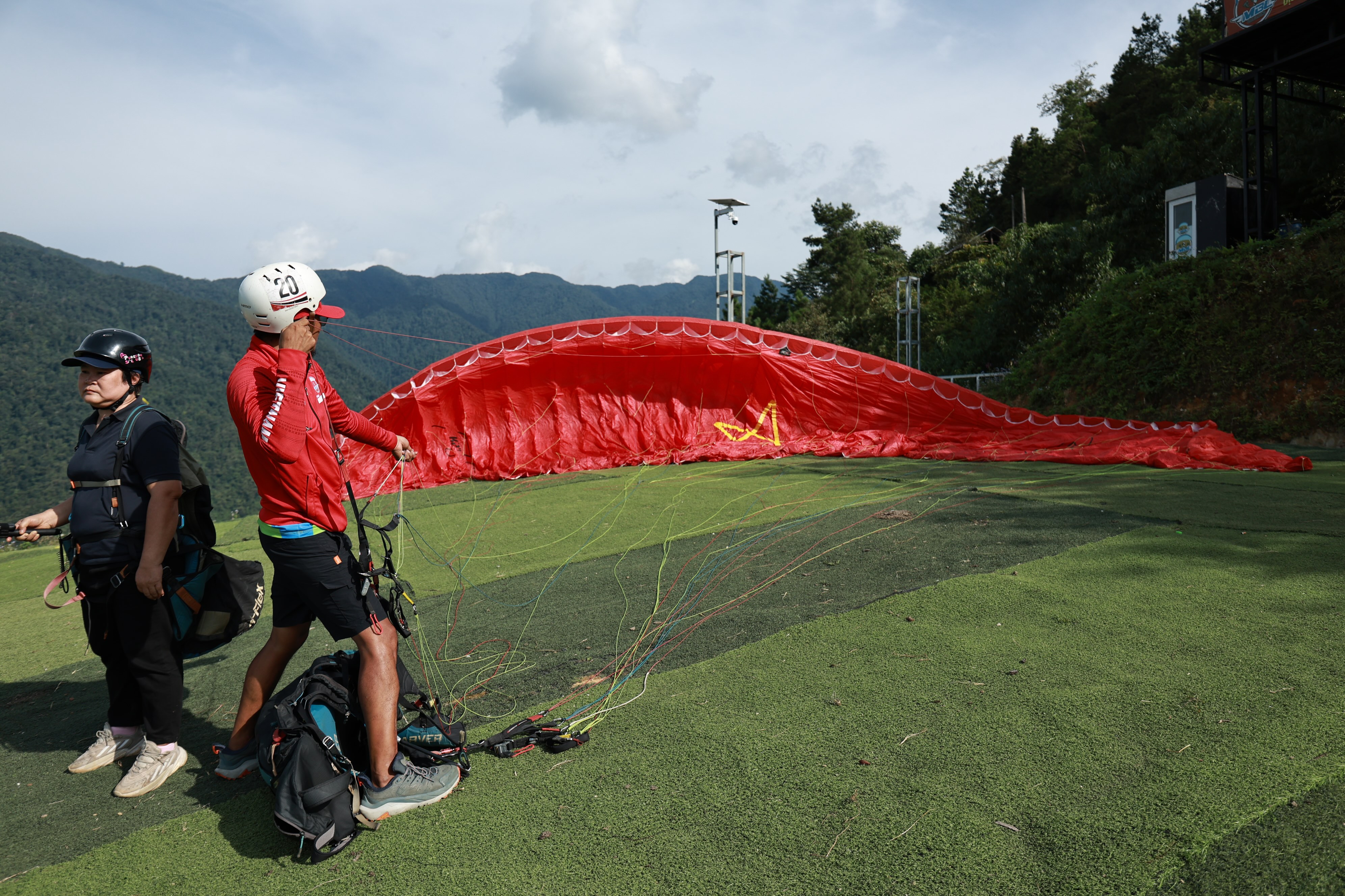 The wing and every line are inspected before launch.