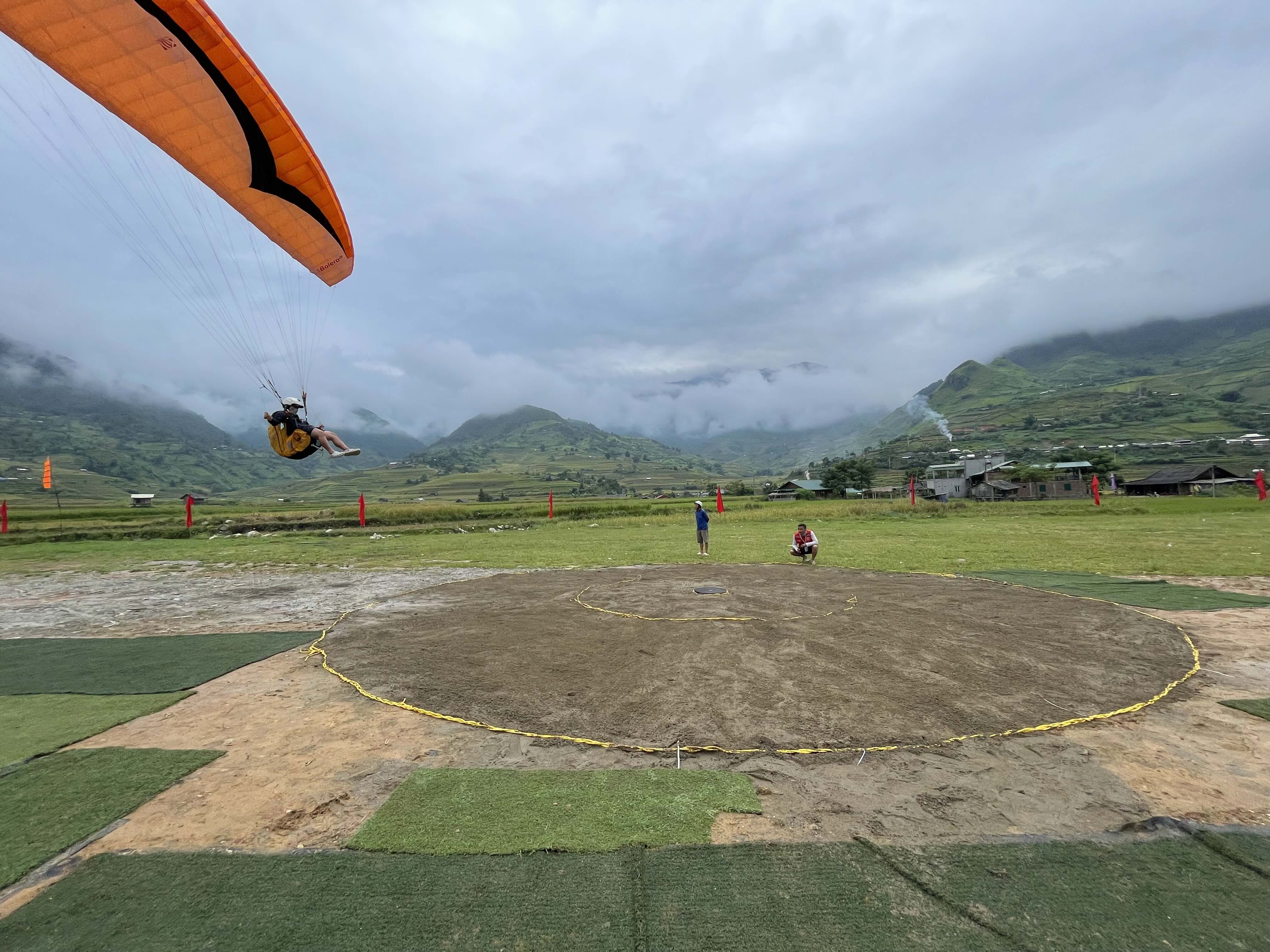 pot landing competition - athletes must land on the center of the target to score.