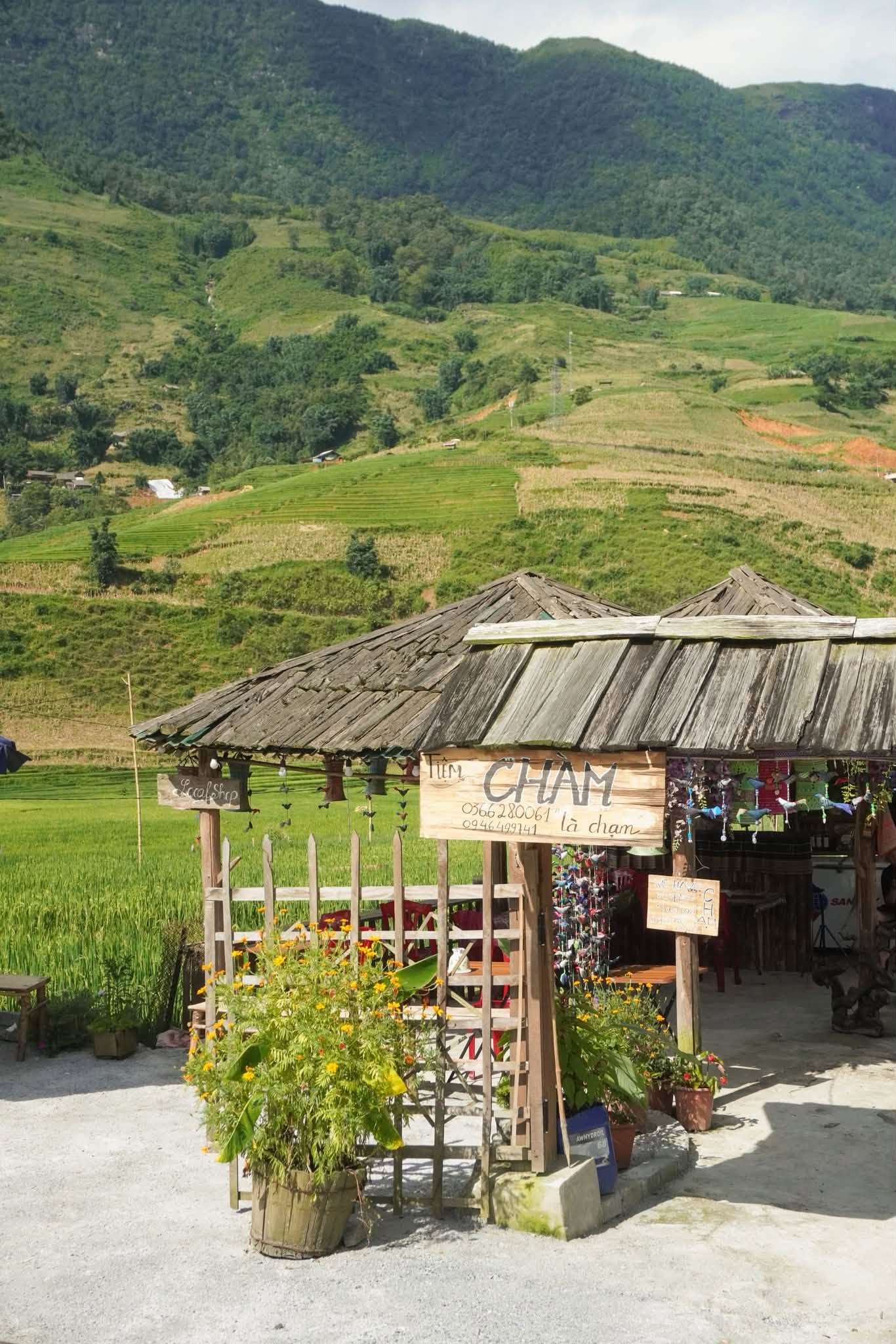 A cozy café along the journey to Sapa, Vietnam, offering a relaxing stop with beautiful mountain views and a peaceful atmosphere