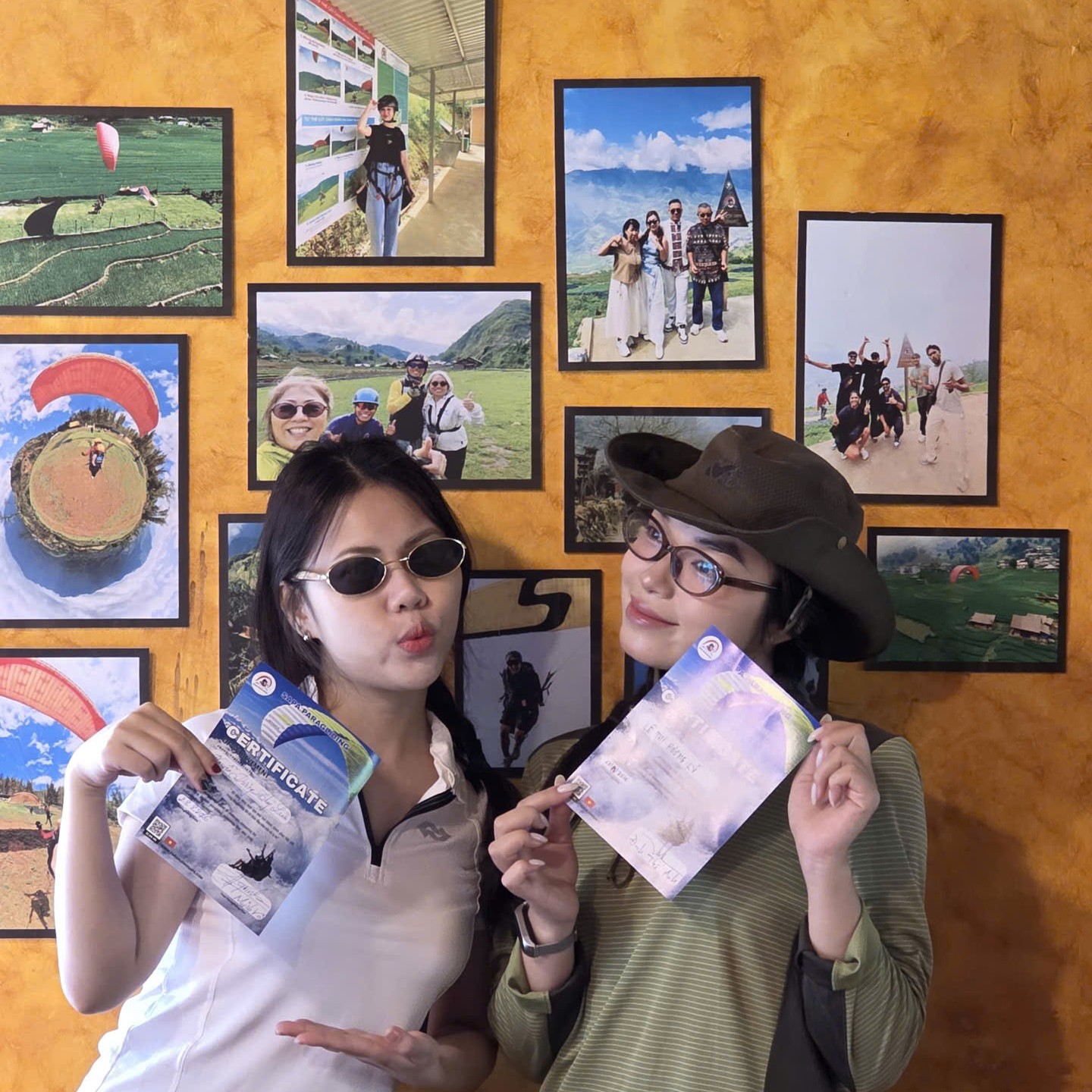 Passengers with their flight certificates at the Sapa Paragliding clubhouse