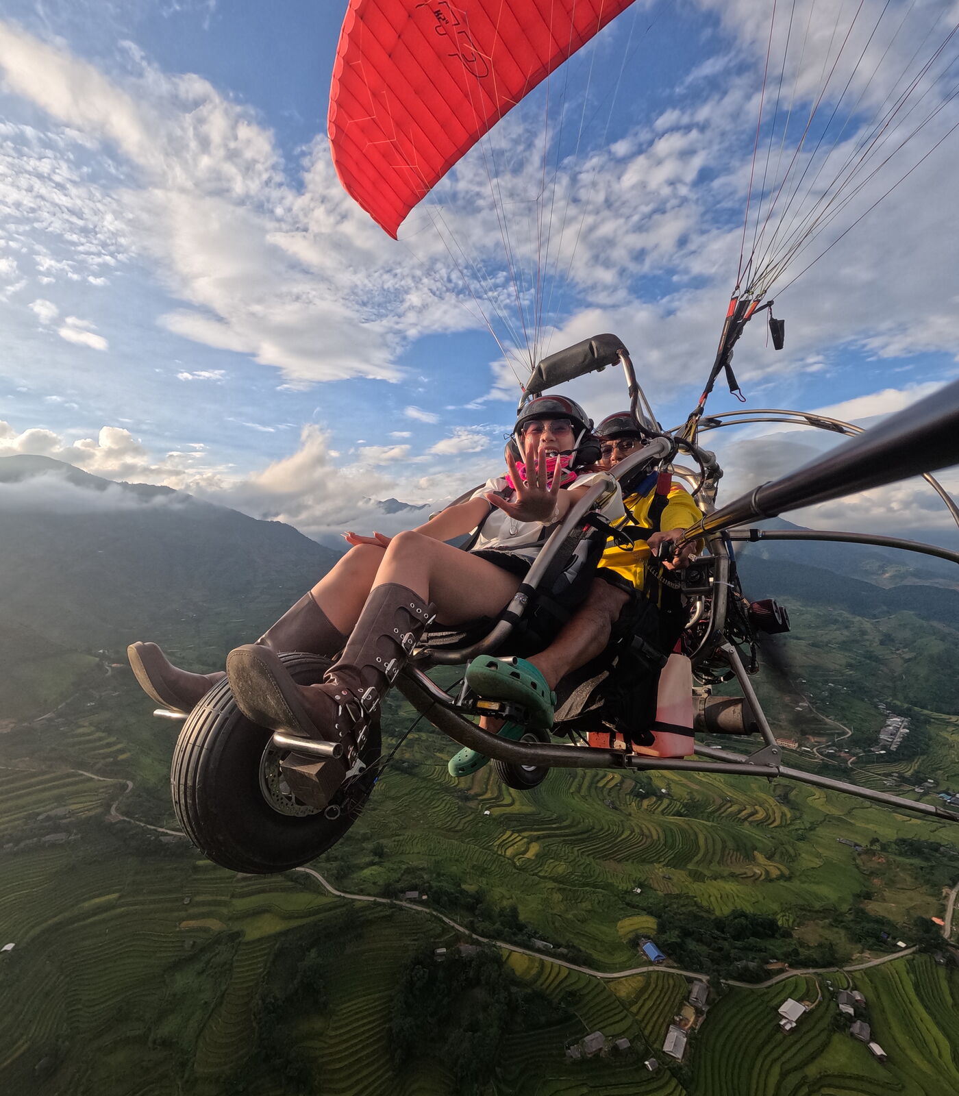 PPG Trike at Mebayluon: seated on a three-wheeled cart, taking off and landing on wheels