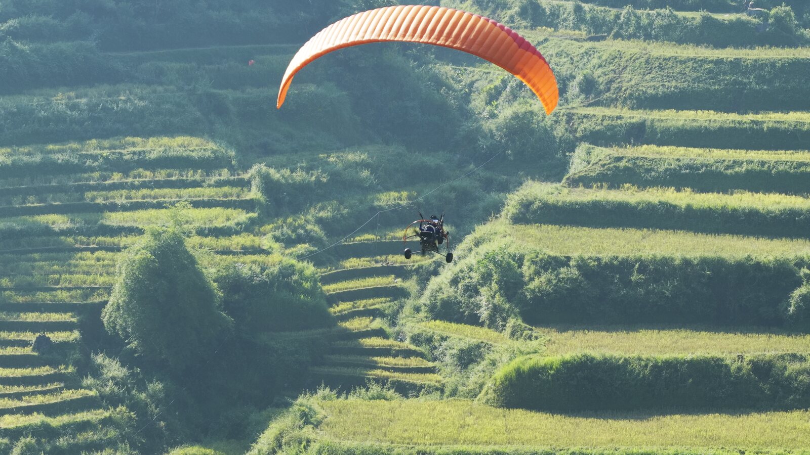 Paramotor at Khau Pha: Powered Paragliding in Mu Cang Chai — 2026 Prices, 10–25 Minute Flights, Cloud and Sunset - 2