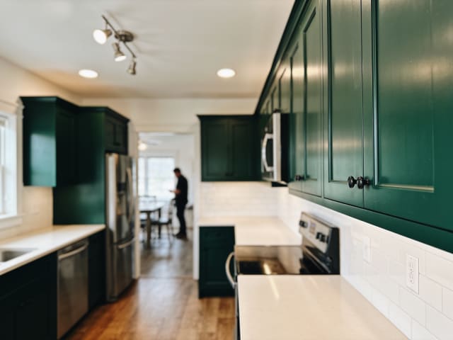 Beautifully finished kitchen cabinets during the final walkthrough with homeowner