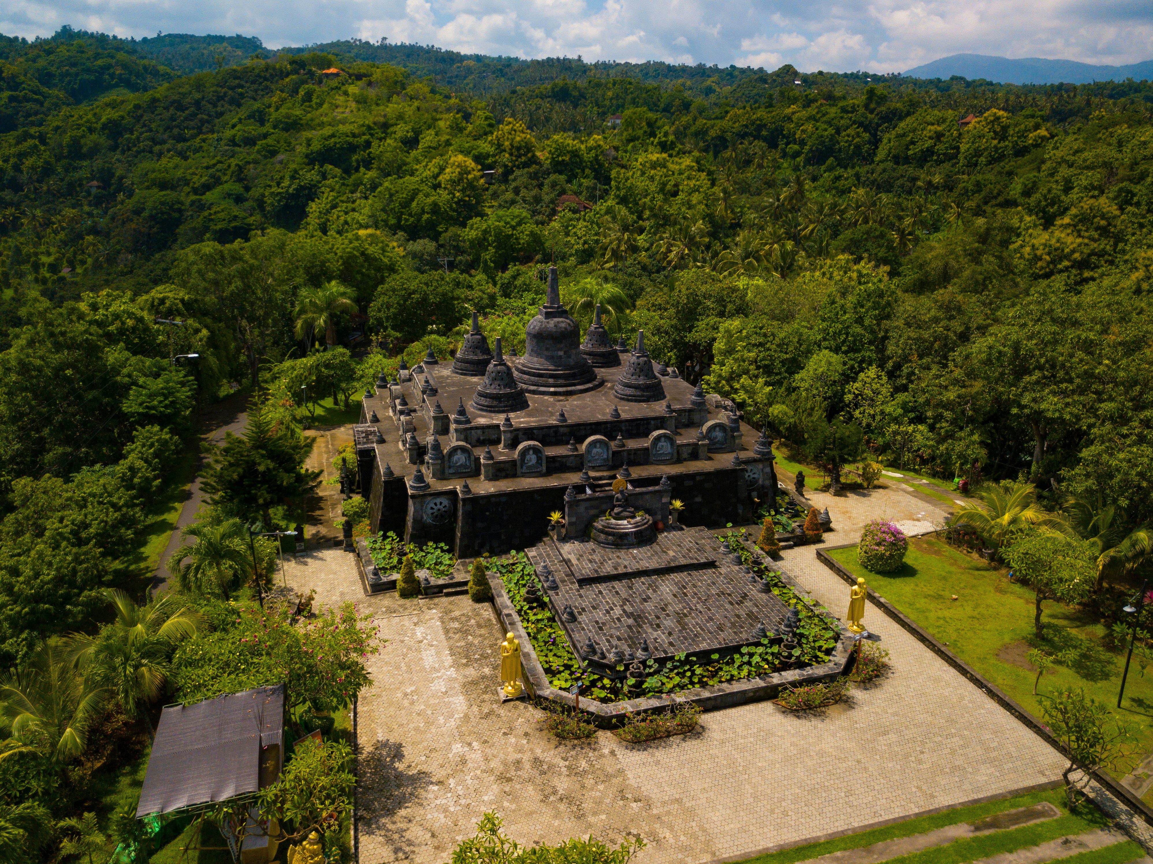 Brahmavihara-Arama Buddhist Monastery surrounded by lush greenery in Bali.