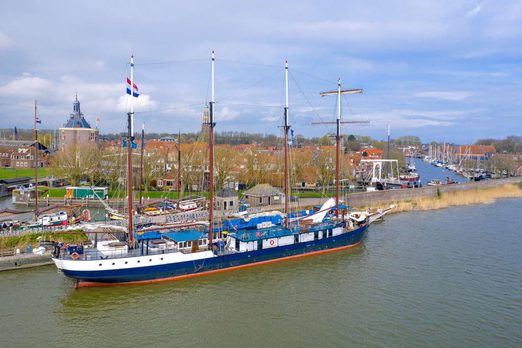 Schooner moored in the harbor of Enkhuizen, a historic town in the Netherlands.
