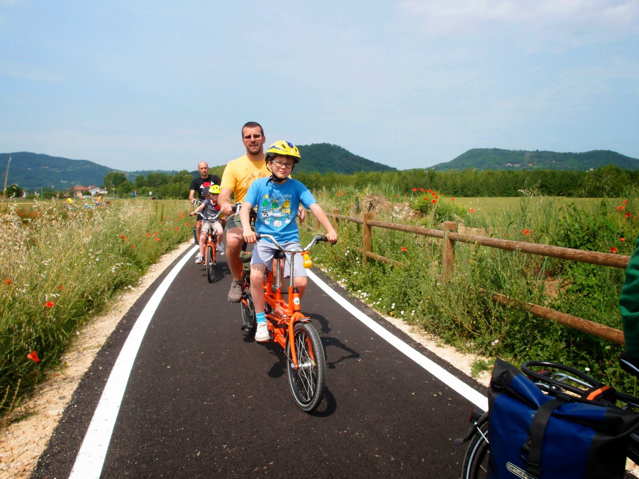 Families in tandem along the Euganean Hills cycle path, Padua
