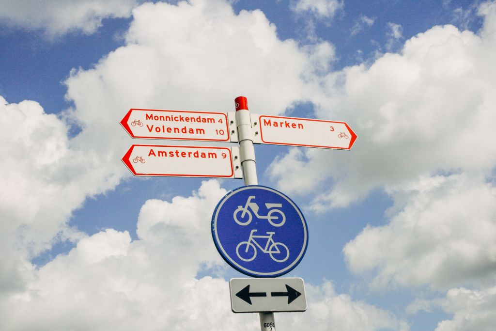 Bicycle signpost with route directions Netherland