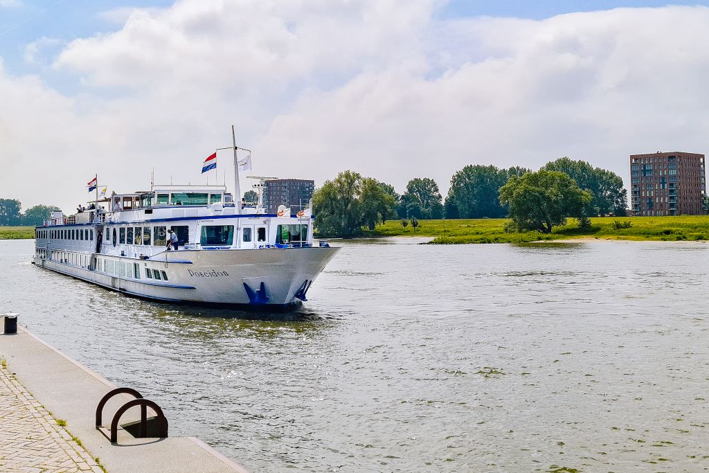 River cruise ship docked along the river in the Netherlands.