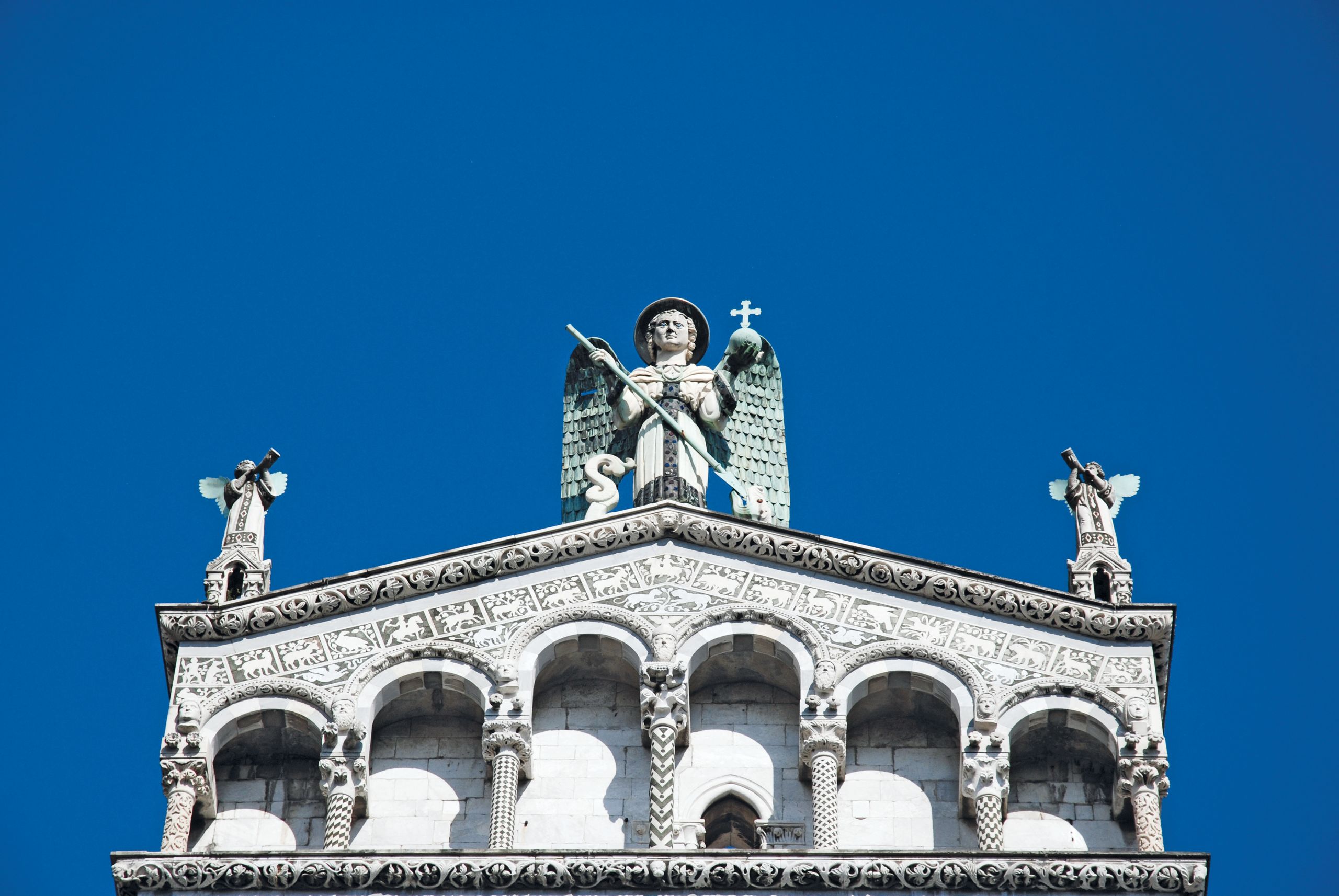 Detail of the facade of San Michele in Foro Basilica in Lucca, Italy.